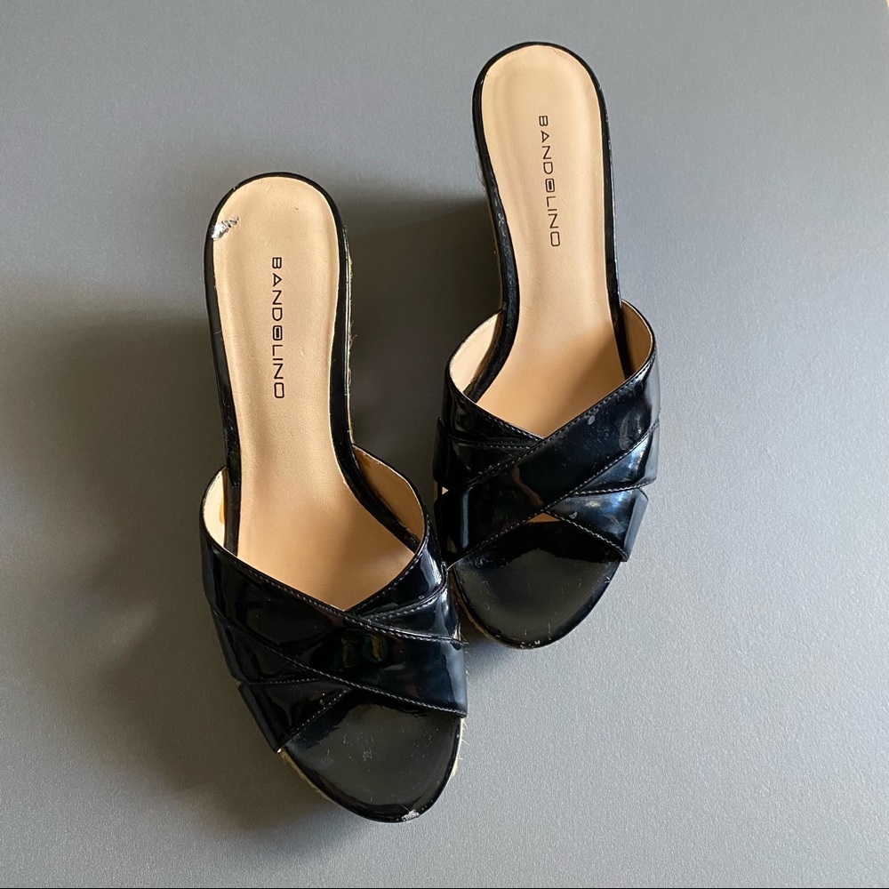 Black patent leather espadrilles.